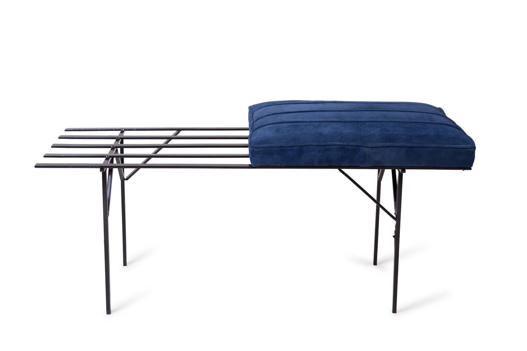 One iron and suede slat bench from France, circa mid-1950s. This example has a powder coated iron frame and has been newly upholstered in bright blue suede. 

Price listed is per bench. 
We have one single bench remaining.