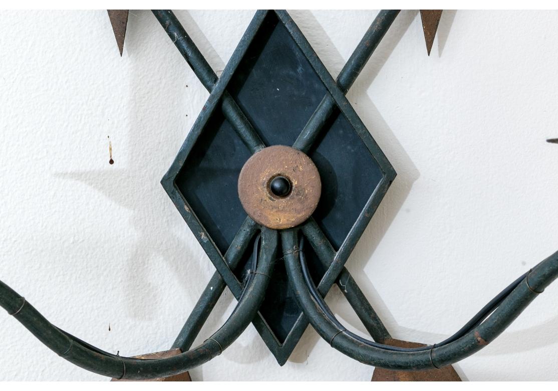 Pair Of Iron And Tole Two Light Wall Sconces For Sale 1