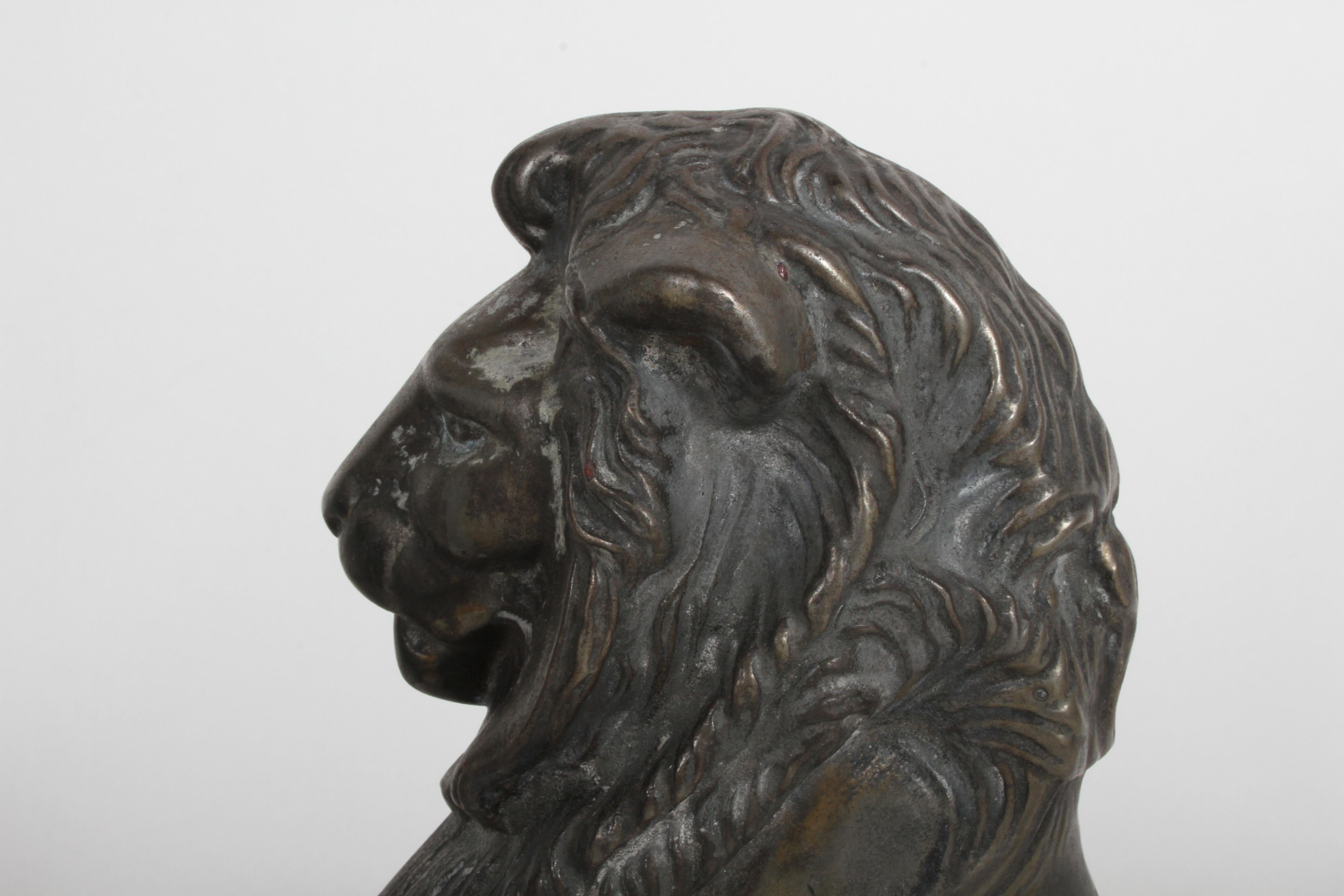 Cast Pair of Iron Andirons or Fire Dogs Modeled as Lions after Artist Alfred Stevens