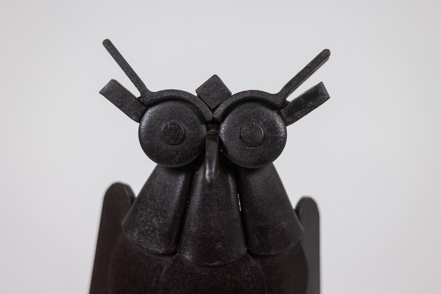 Iron Pair of iron andirons, representing an owl. 1950s.