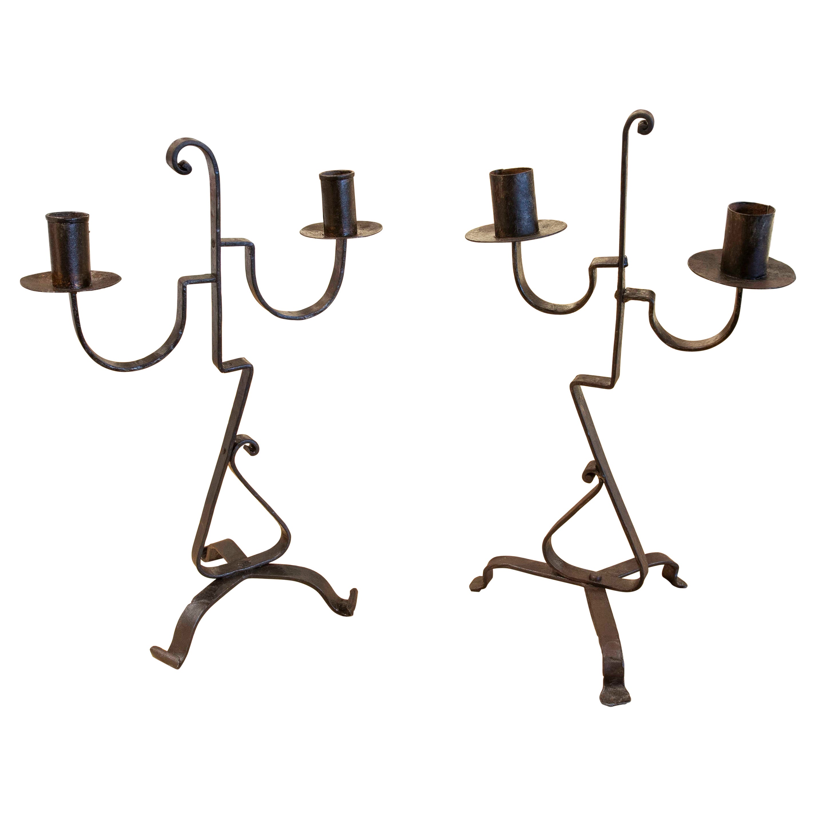 Paire de chandeliers fer