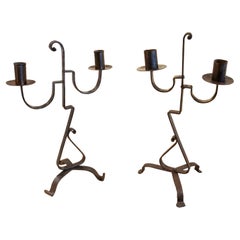 Paire de chandeliers fer