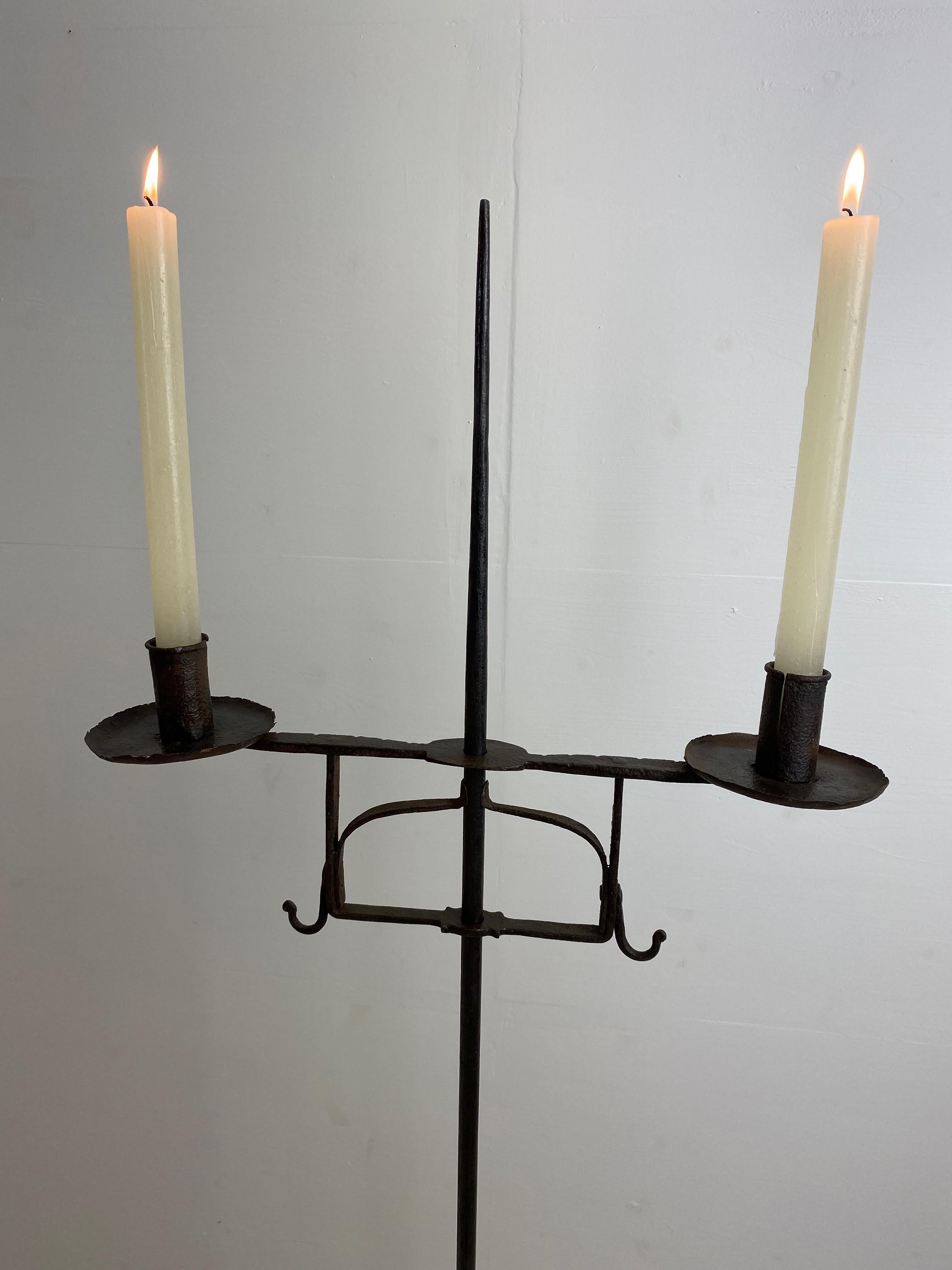 Nice pair of iron chandeliers with movable candleholders
England, early 20th century
Great patina.