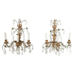 Pair of Iron, Crystal and Carved Giltwood Sconces