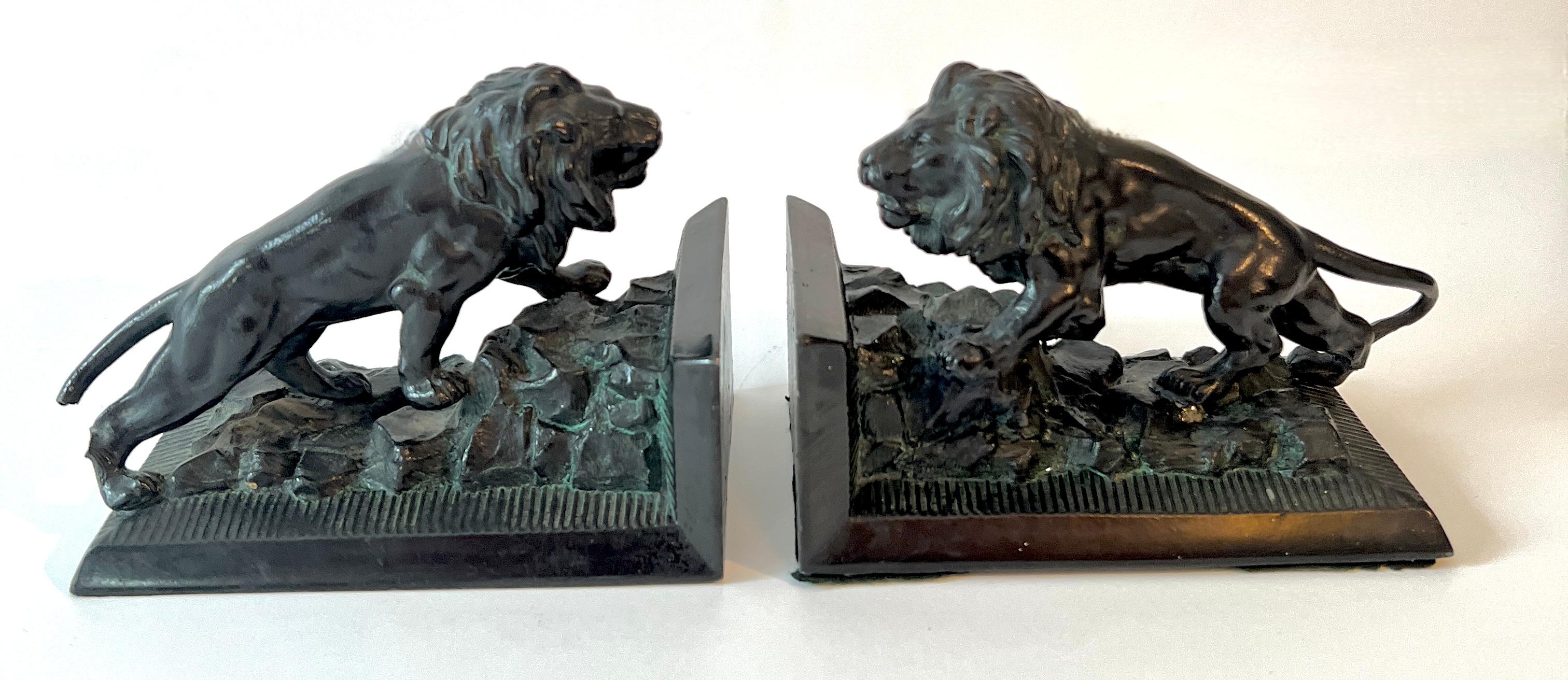 Pair of metal Iron bookends.  The pair are on the smaller side and great for a small shelf, with smaller books or a Childs room.

