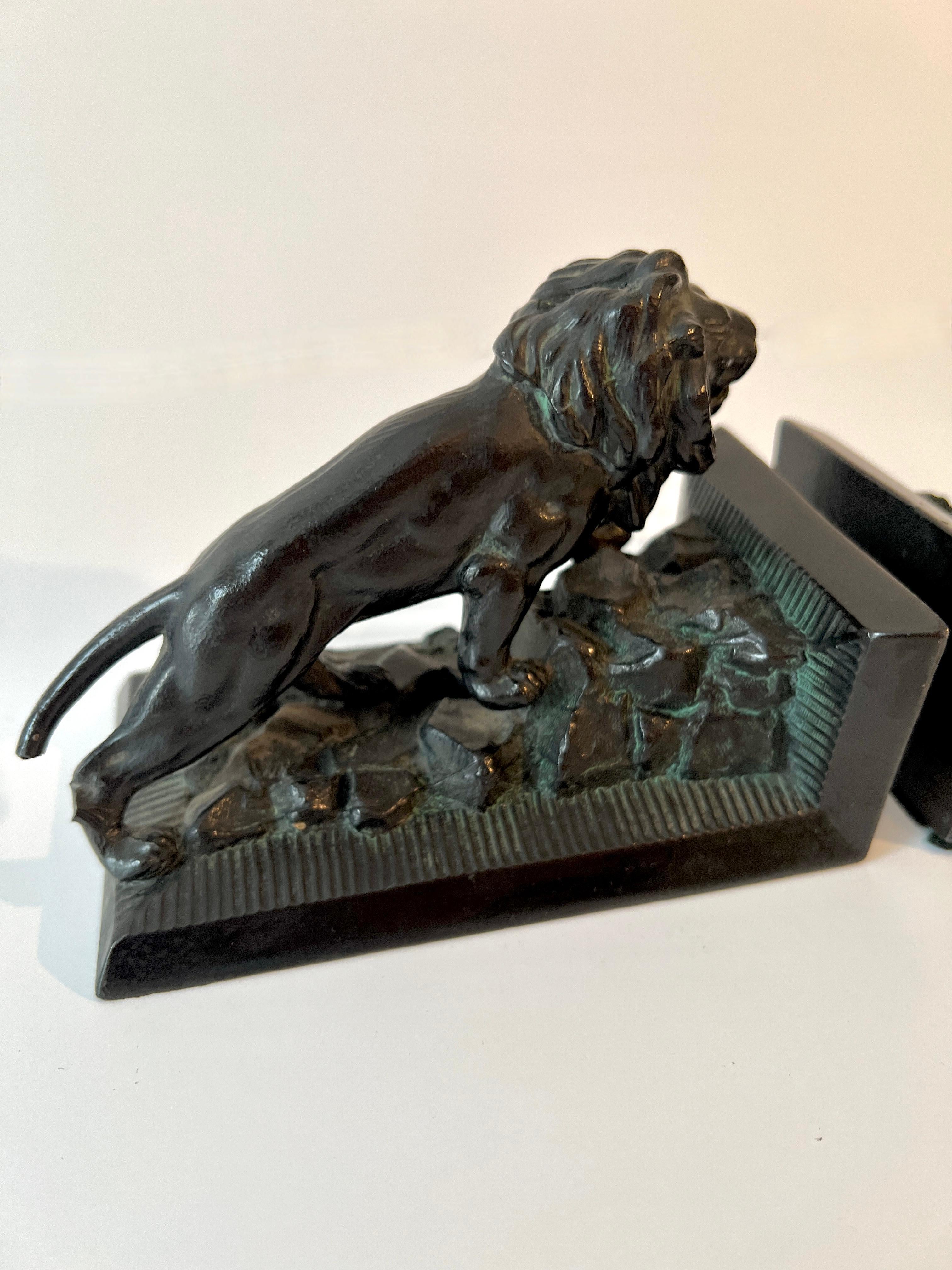 20th Century Pair of Iron Lion Bookends For Sale