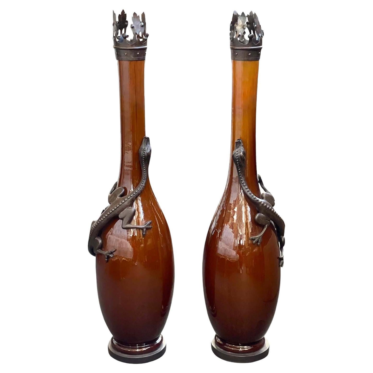 Pair of Iron-Mounted Glazed Earthenware Vases For Sale