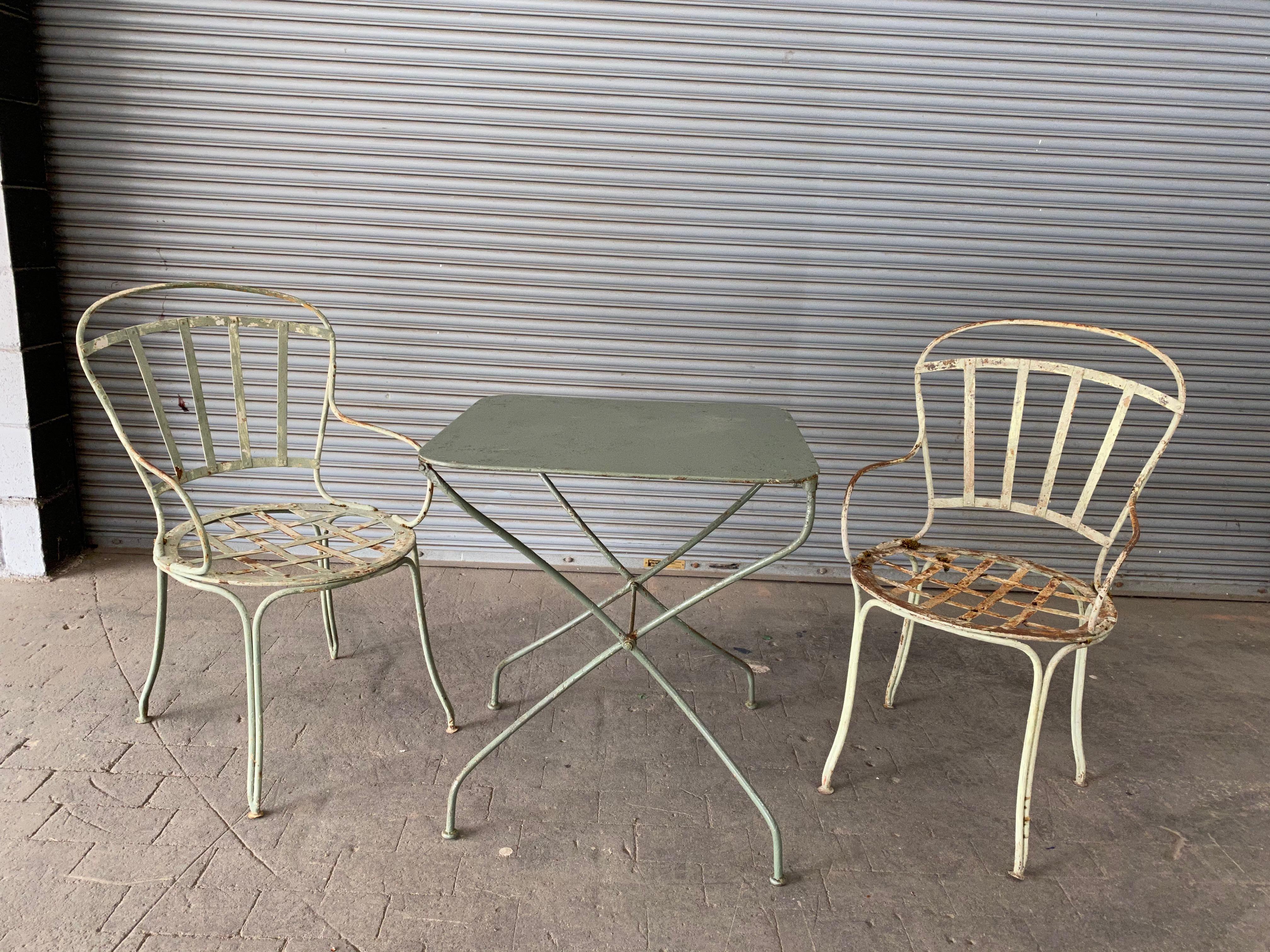 A pair of French garden chairs from the South of France. The iron has a weathered aged patina, circa 1900.

Ref # G0517-04

Dimensions: 35