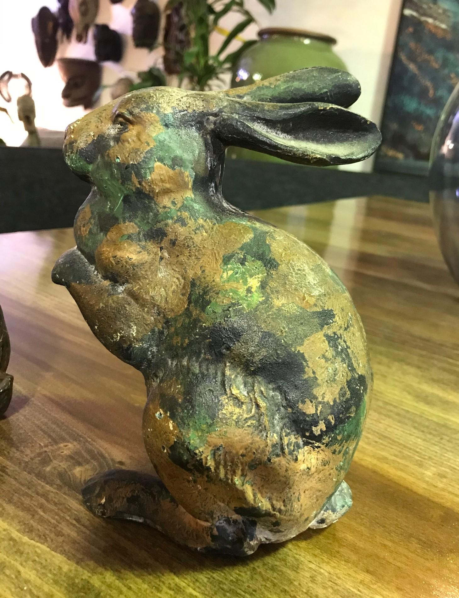 A fantastic pair of iron rabbits with a beautiful patina acquired with age.

Would be a great addition to any setting. 

Dimensions of the tallest piece: 9