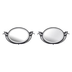 Paire de miroirs muraux en fer, période Art déco France, vers 1930.