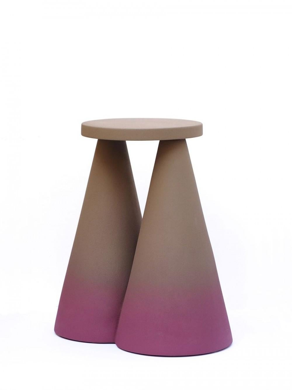 Isola side table by Cara Davide.
Dimensions: 25 x 43 x H 45 
Materials: ceramic / rough touch finishing.

Isola side table is completely made in ceramic using high temperature furnace, to make the material stronger. The large base makes the