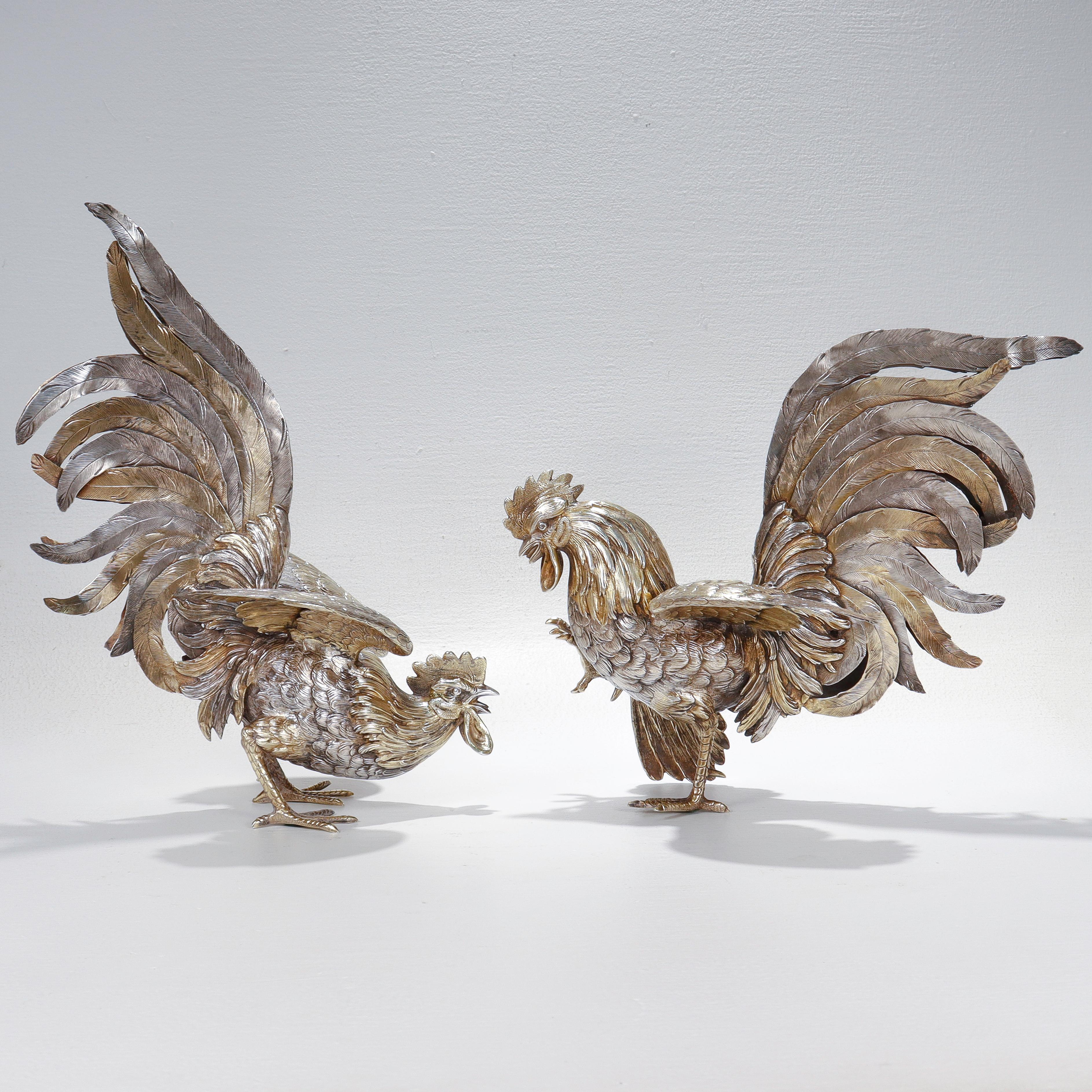 A fine pair of large fighting cockerel or rooster table ornaments.

Marked for Israel Freeman & Son.

In sterling silver with gilding throughout.

With finely cast & engraved details to the bodies.

Hallmarked to the feet.

Simply top level silver