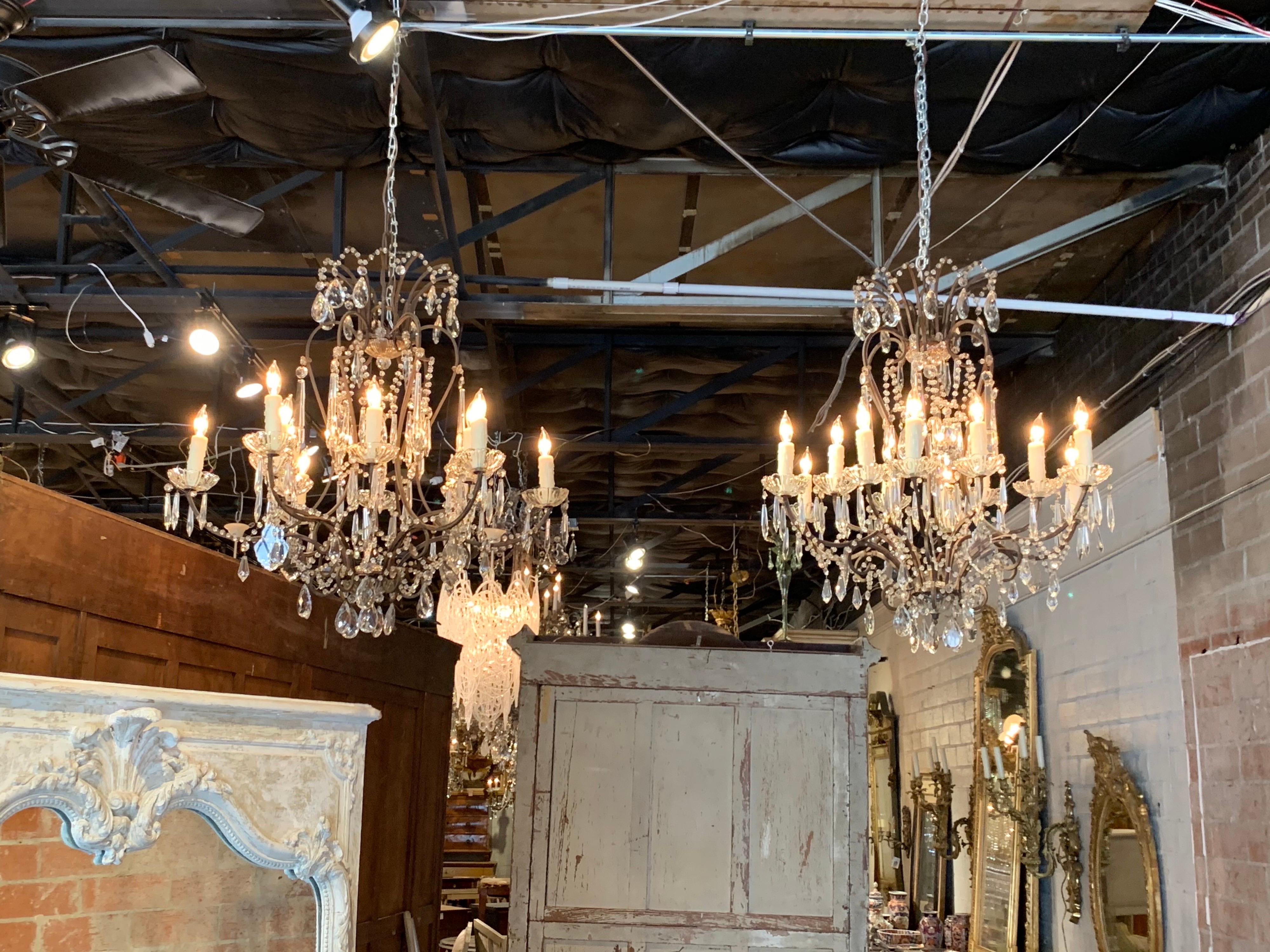 Metal Pair of Italian 12-Light Beaded Crystal Chandeliers