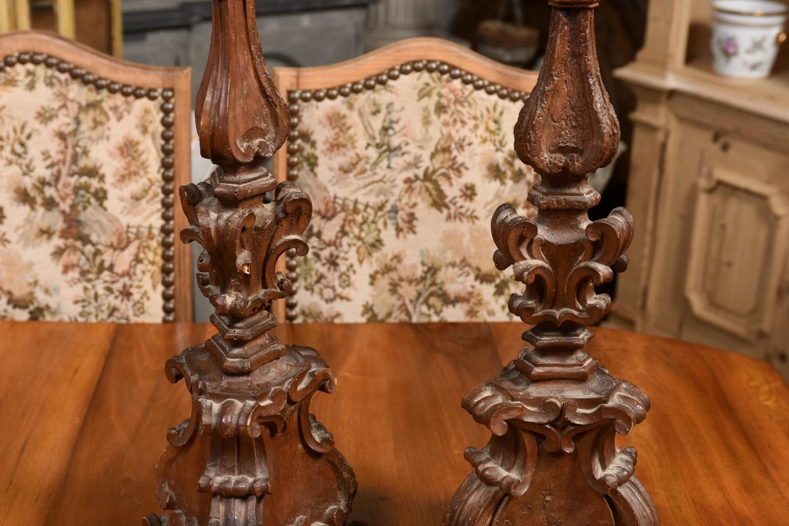 Wood Pair of Italian 17th Century Baroque Period Altar Candlesticks with Carved Décor For Sale