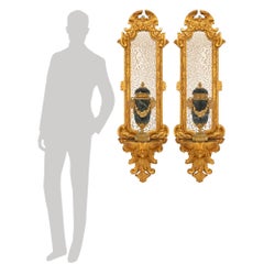 pair of Italian 17th century Baroque period Giltwood mirrored wall brackets