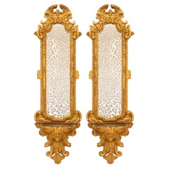 pair of Italian 17th century Baroque period Giltwood mirrored wall brackets
