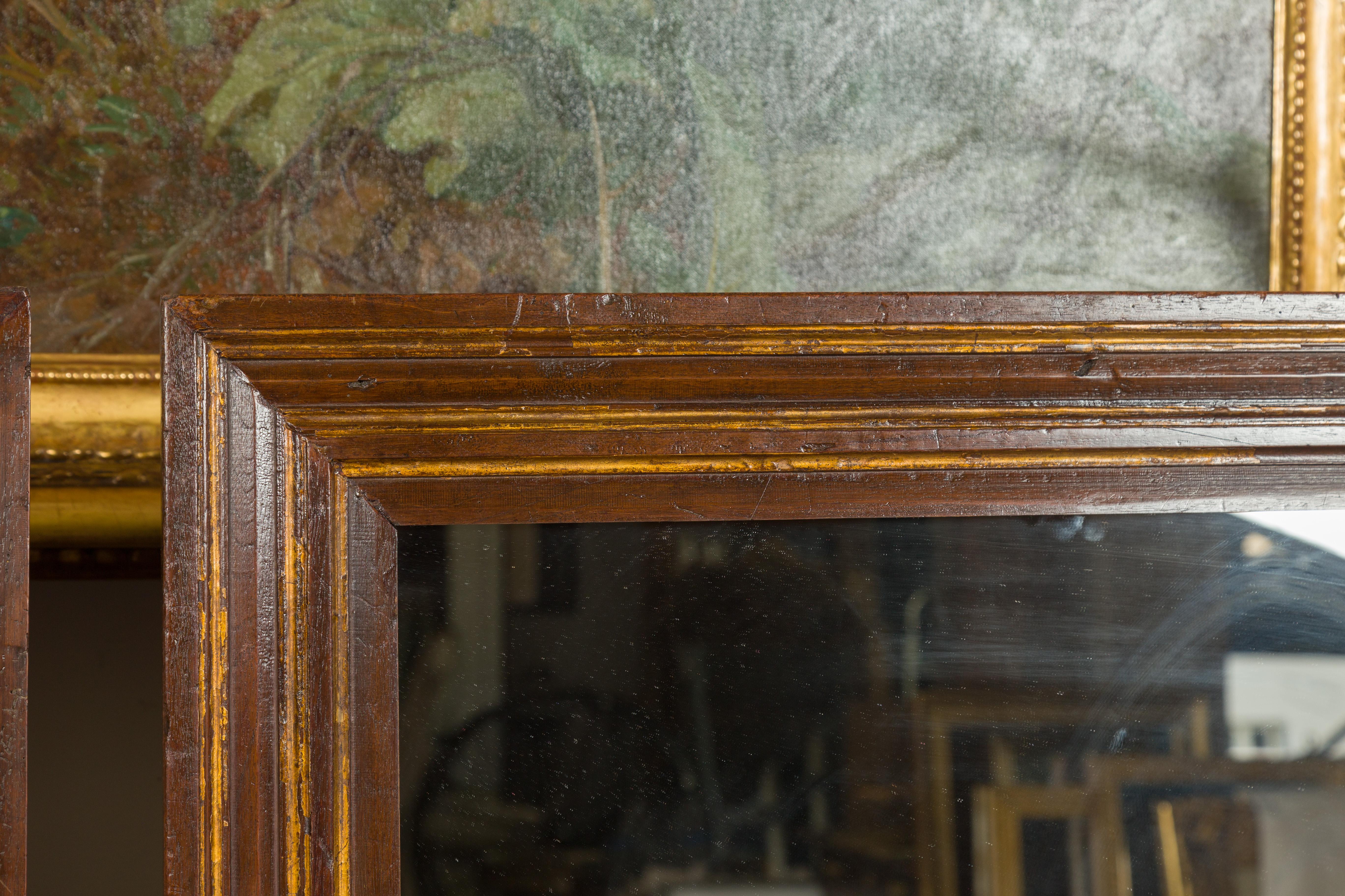 19th Century Pair of Italian 1820s Walnut Rectangular Brown Mirrors with Gilded Accents