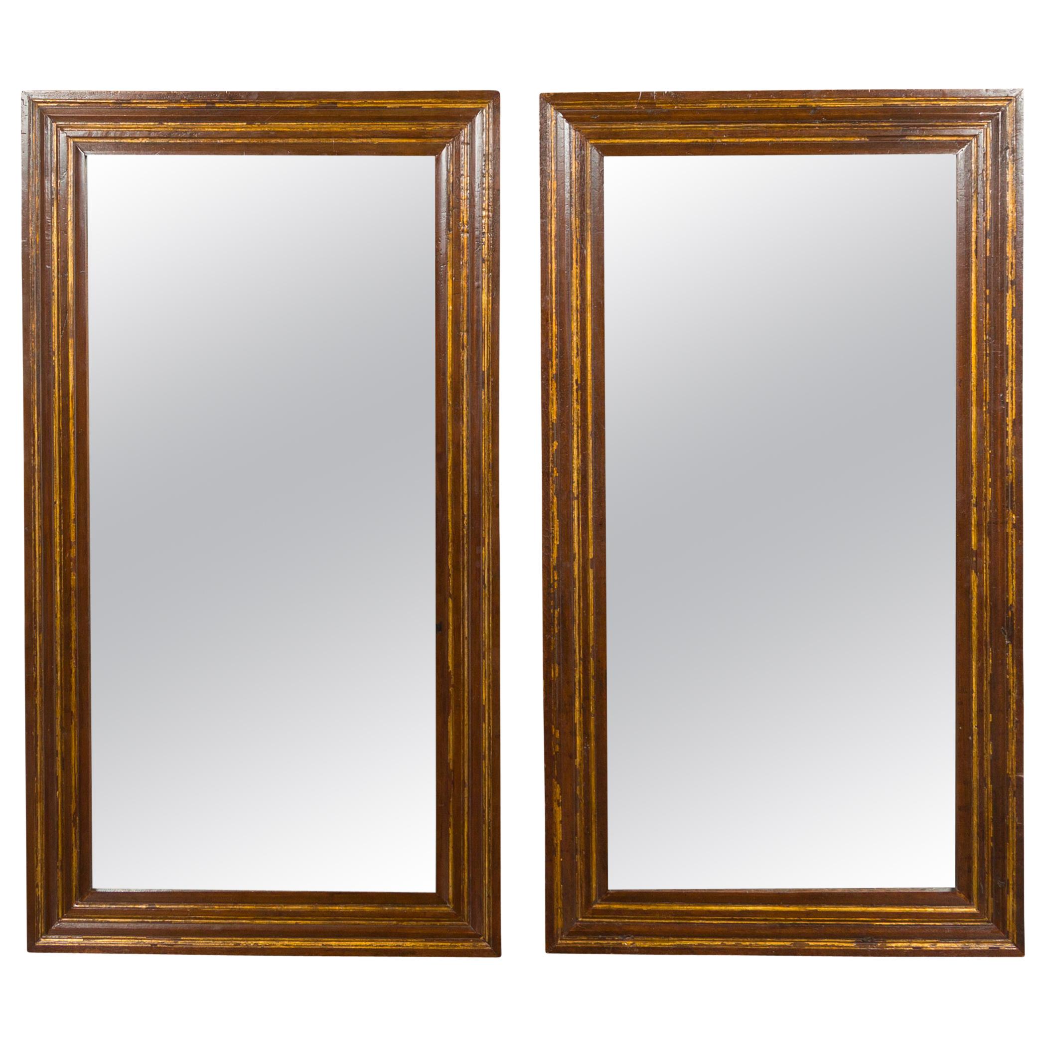 Pair of Italian 1820s Walnut Rectangular Brown Mirrors with Gilded Accents