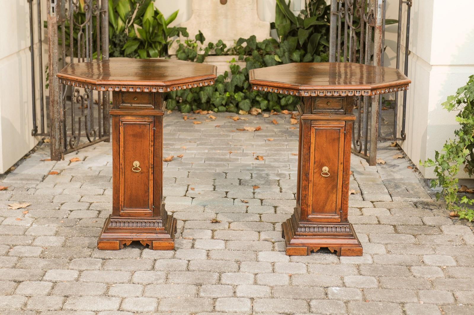 19th Century Pair of Italian 1850s Walnut Octagonal Pedestal Carved Tables with Single Door