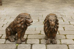 Pair of Italian 1880s Small Walnut Hand Carved Lion Sculptures with Dark Patina