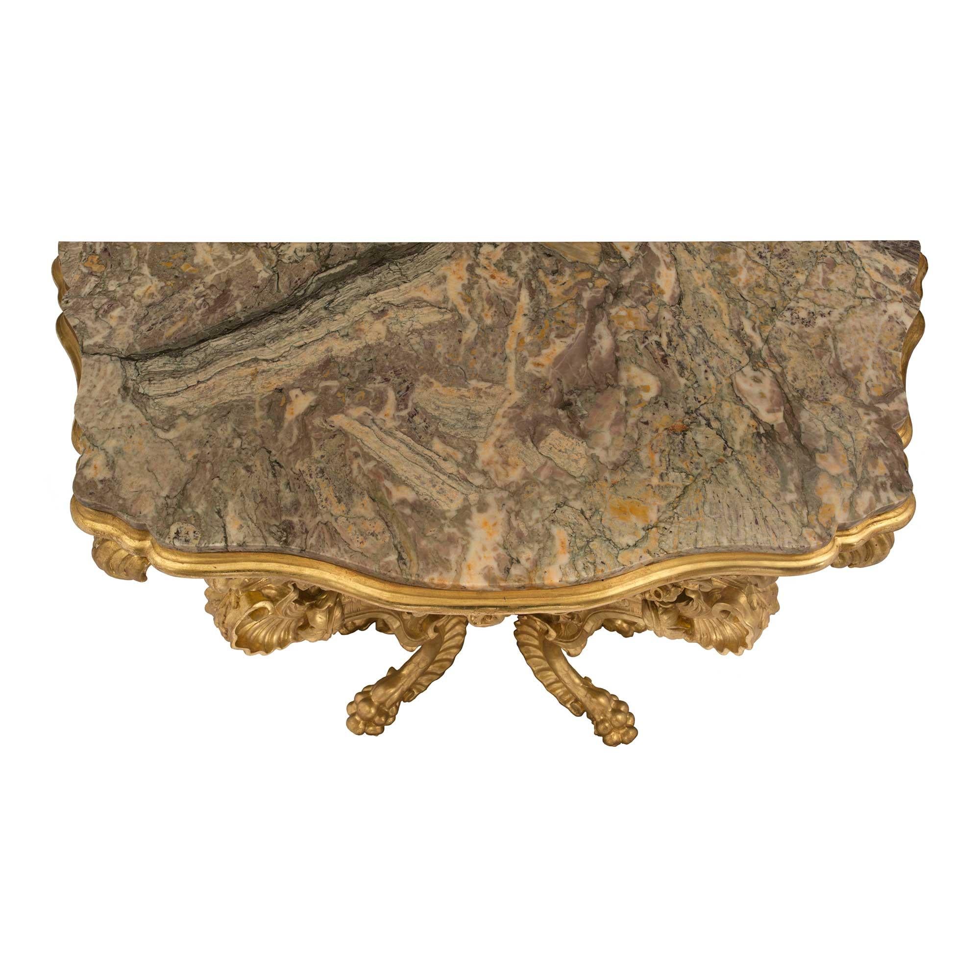 18th Century and Earlier Pair of Italian 18th Century Baroque Giltwood and Marble Four Legged Consoles For Sale