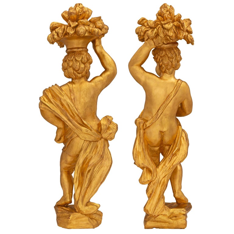 Pair of Italian 18th Century Baroque Period Giltwood Statues For Sale