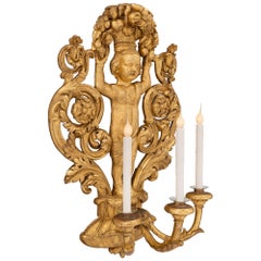Pair of Italian 18th Century Baroque Period Giltwood Three-Arm Sconces