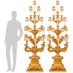 pair of Italian 18th century Baroque st. Giltwood Torchière floor lamps