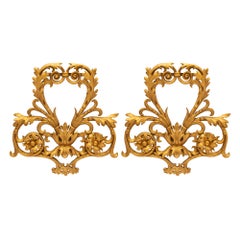 Coppia di decorazioni da parete in legno dorato barocco italiano del XVIII secolo