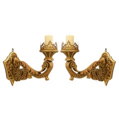 pair of Italian 18th century Baroque st. patinated Wood and Giltwood sconces