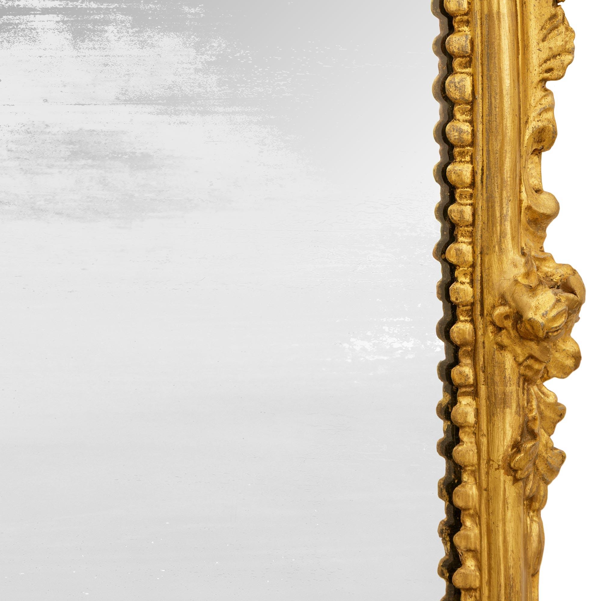 pair of Italian 18th century Giltwood and patinated Bronze mirrored sconces For Sale 1