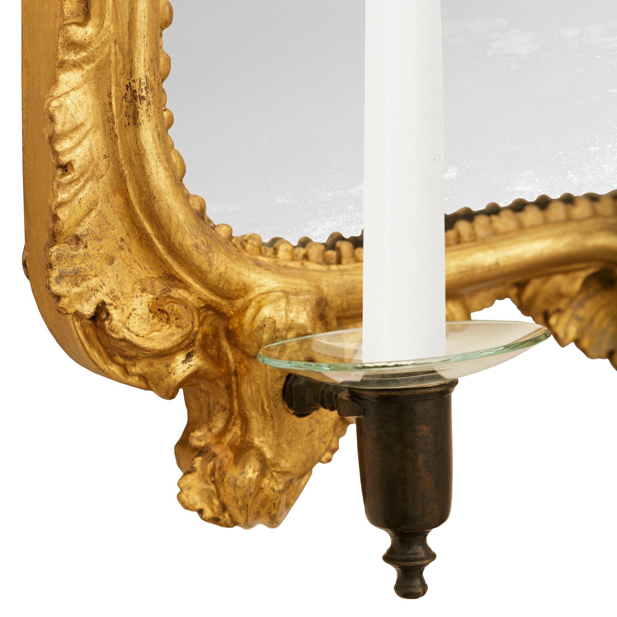pair of Italian 18th century Giltwood and patinated Bronze mirrored sconces For Sale 2
