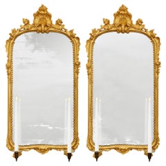 coppia di appliques a specchio in legno dorato e bronzo patinato del 18° secolo