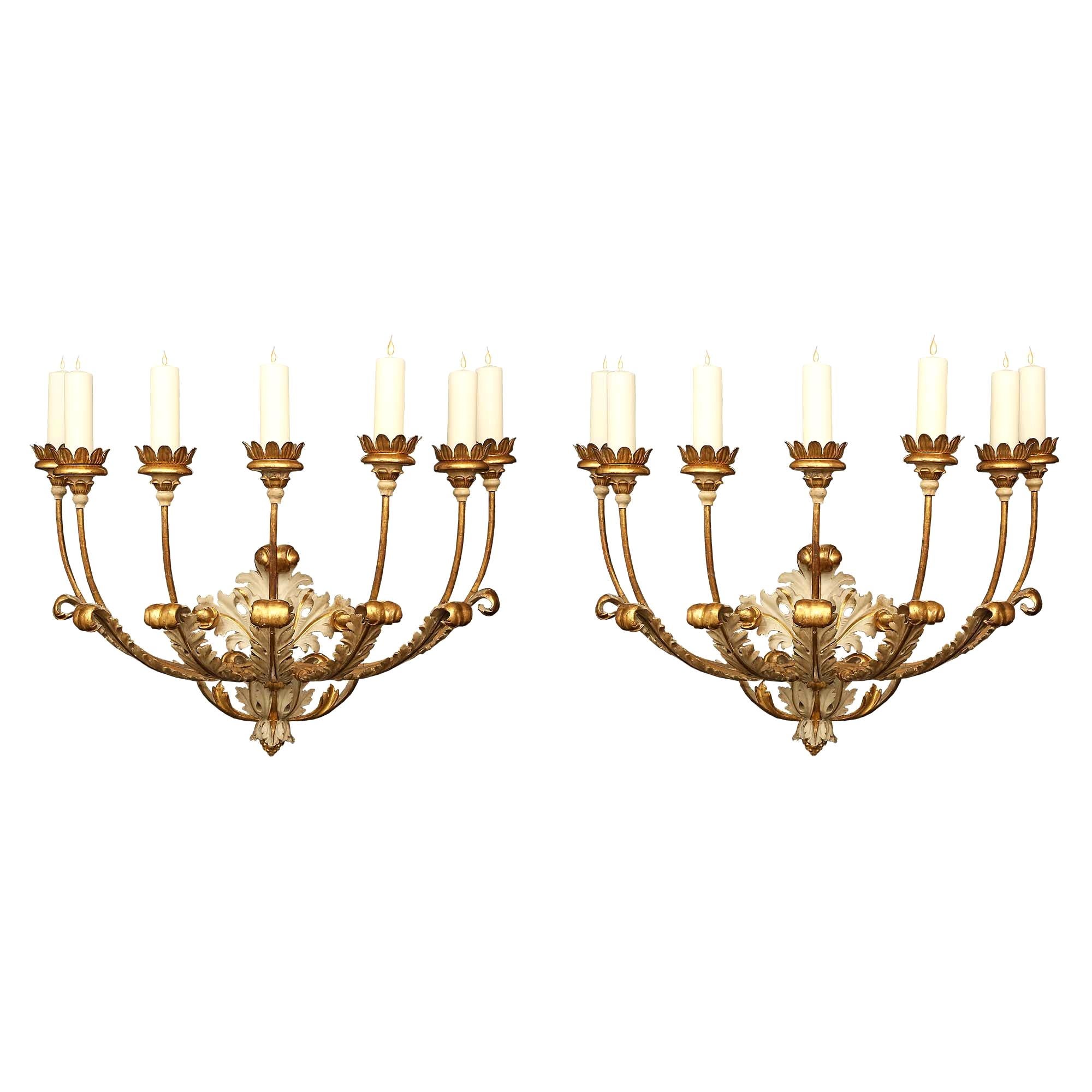 Pair of Italian 18th Century Giltwood and Patinated Seven Arm Sconces