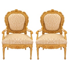 Pair of Italian 18th Century Louis XV/XVI Giltwood Throne Armchairs