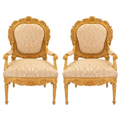 Pair of Italian 18th Century Louis XV/XVI Giltwood Throne Armchairs