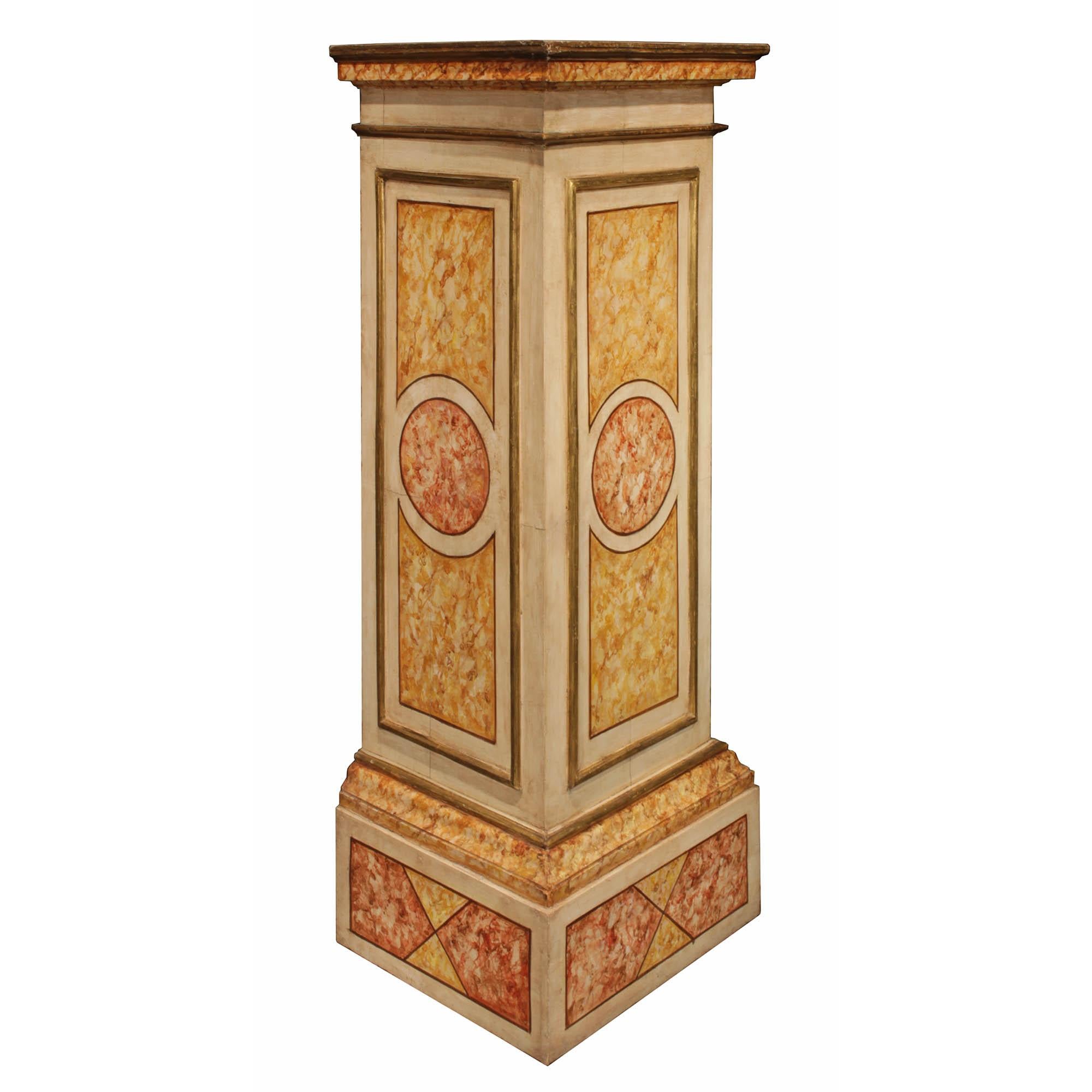 A pair of very attractive Italian 18th century mecca and polychrome pedestals. The pedestals have a faux marble painted finish throughout. Each pedestal is raised on a mottled top square base. At the column above is an 