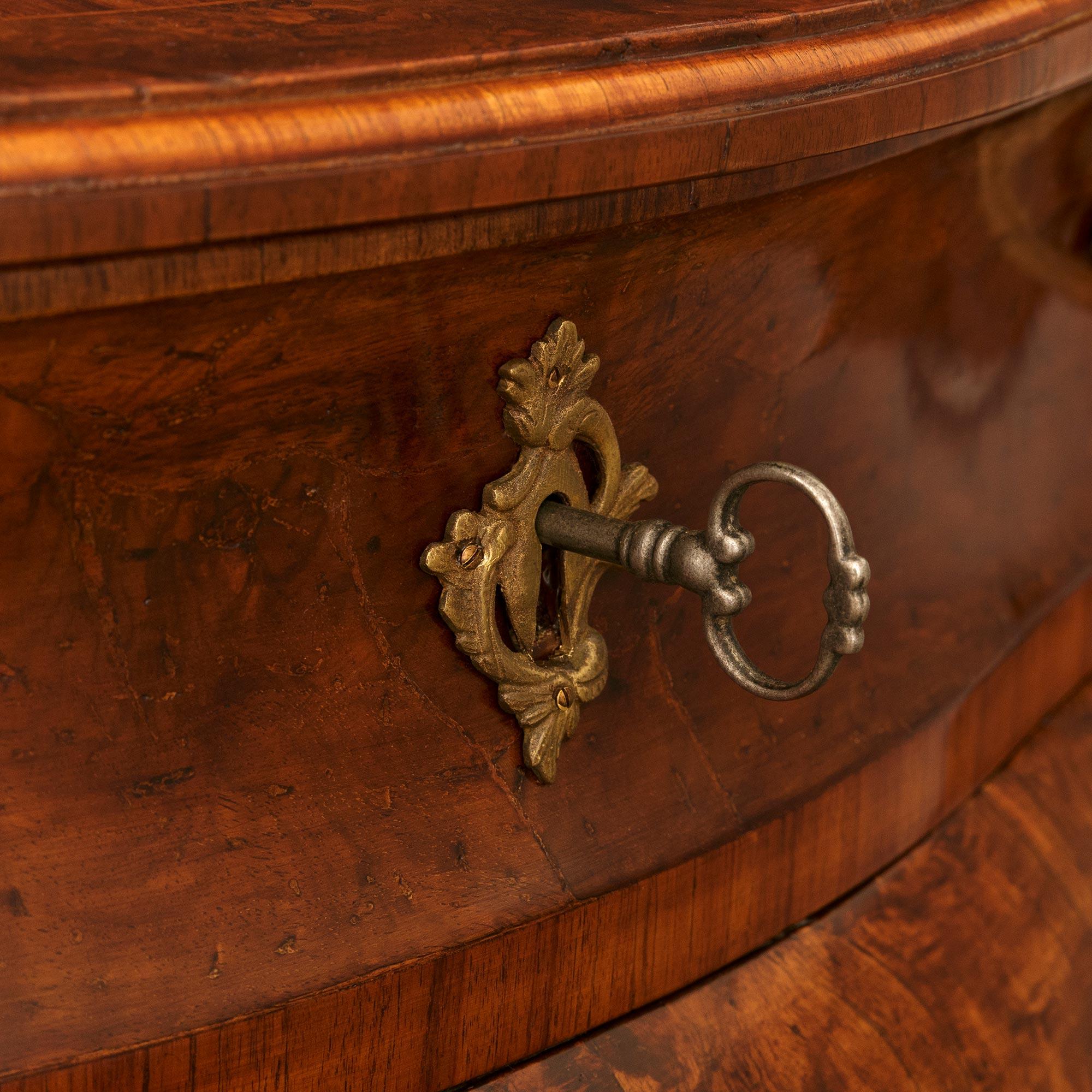 pair of Italian 18th century Rococo Period Walnut and Fruitwood commodes (Bronze) im Angebot