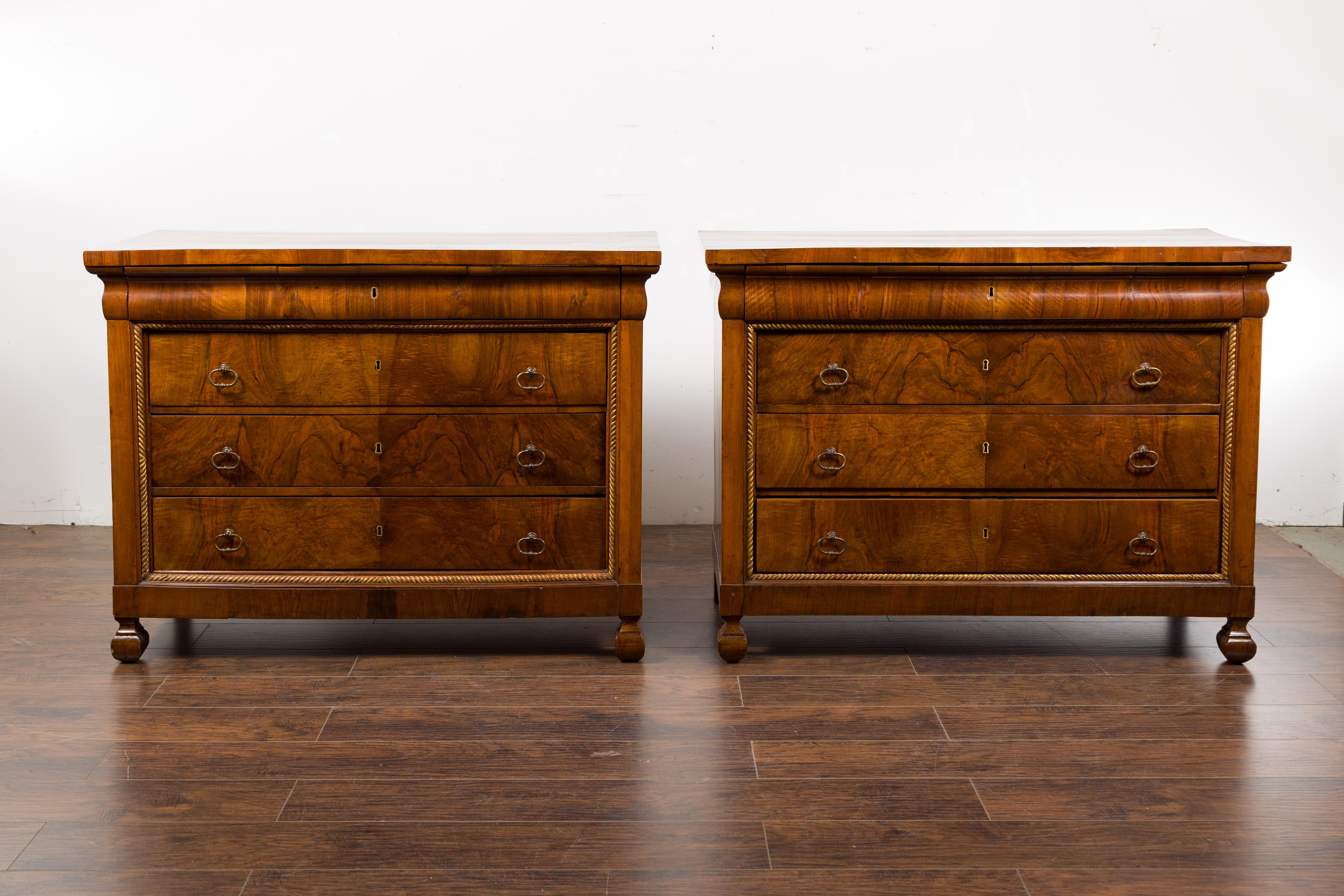Carved Pair of Italian 18th Century Walnut Four-Drawer Commodes with Bookmatched Veneer For Sale
