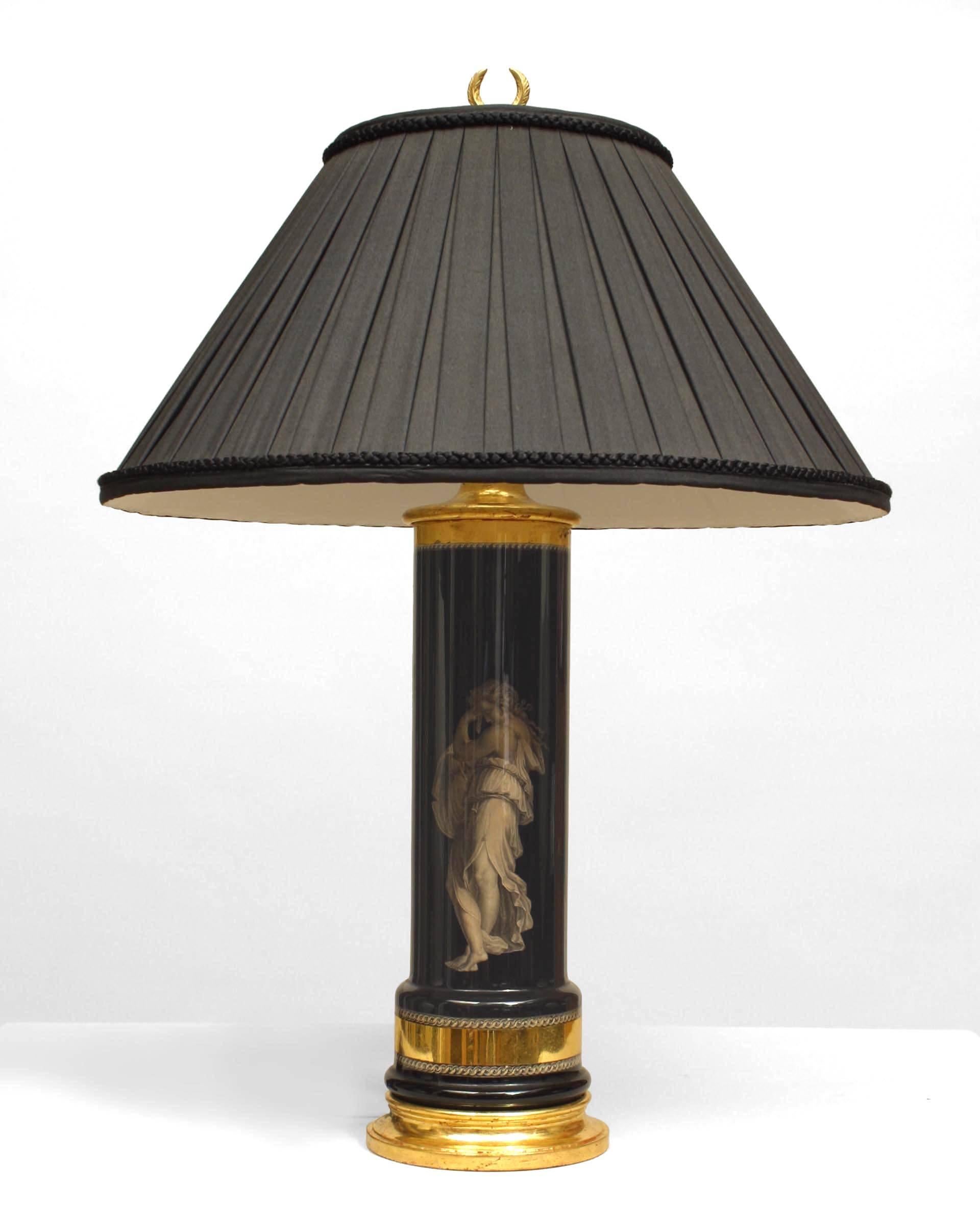 Pair of Italian 1940/50s black cylindrical √©glomis√© glass table lamps with classical figures of a man and lady on a round gilt wood base (PRICED AS Pair)
