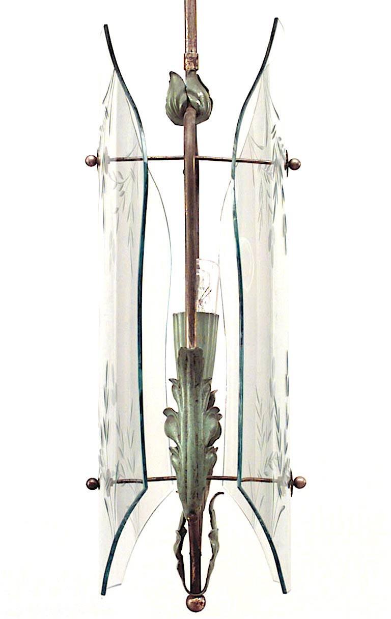Pair of Italian 1940s hanging lanterns with 2 green metal leaf design arms between 2 shaped floral etched glass panels canopy. (FONTANA ARTE; designed attributed: PIETRO CHIESA) (PRICED AS Pair).
