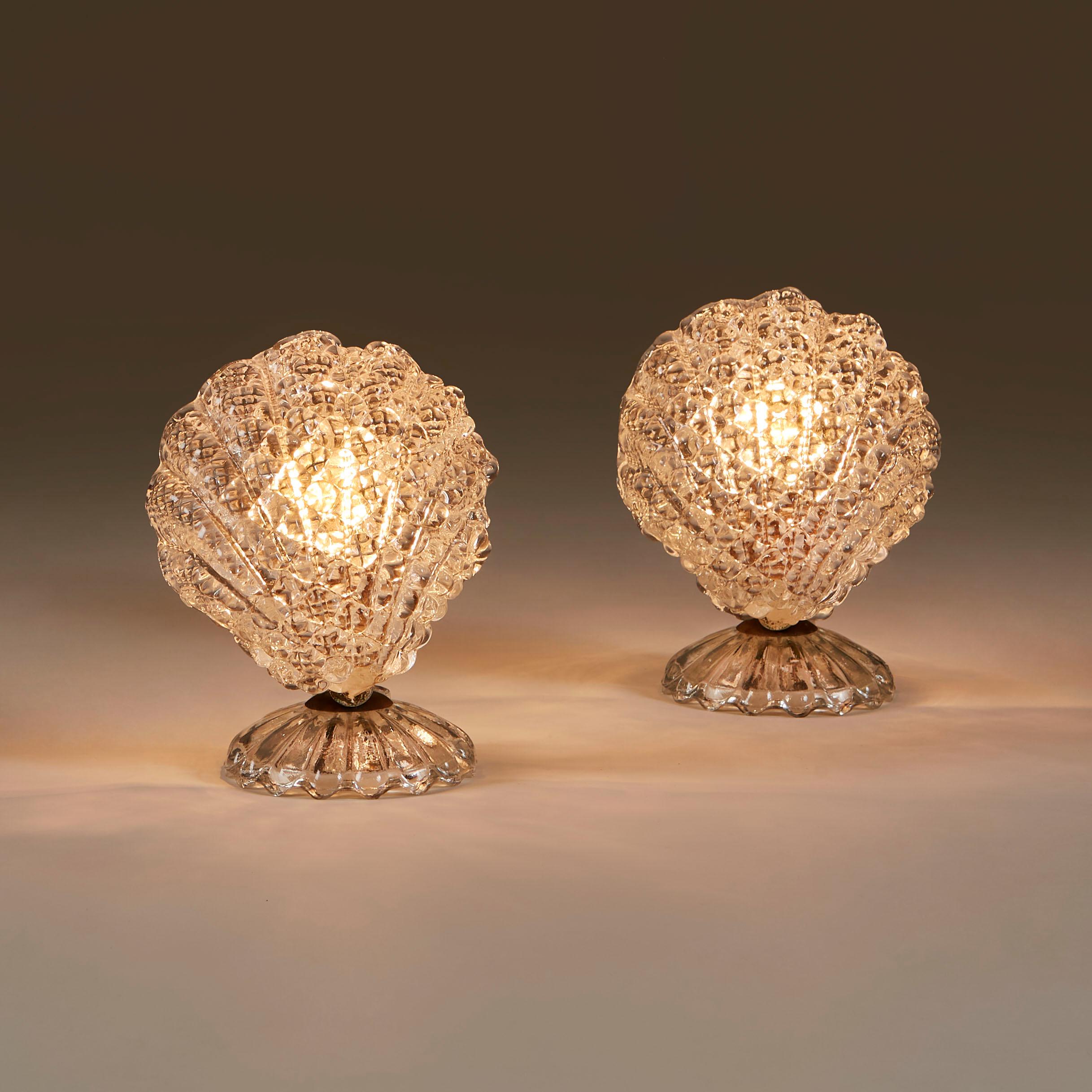 Elegant pair of shell shaped textured glass shades sit on circular scalloped glass base by Barovier e Toso. 1940s art deco. Exudes a soft light. Perfect for a dressing-table or desk or anywhere in need of a mood enhancing touch.