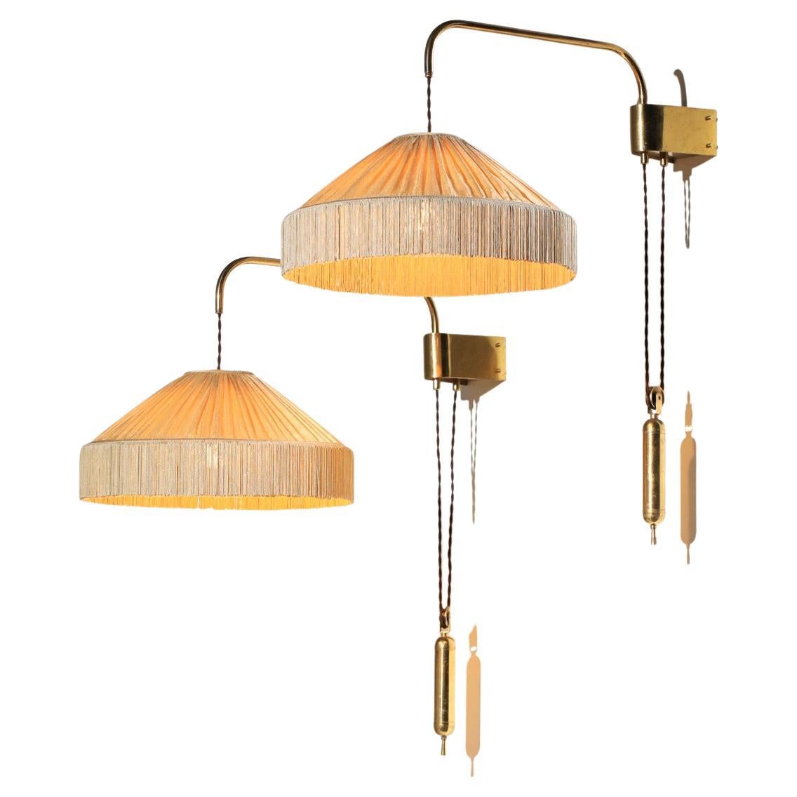 Coppia di applique italiane in ottone degli anni 
50 in vendita