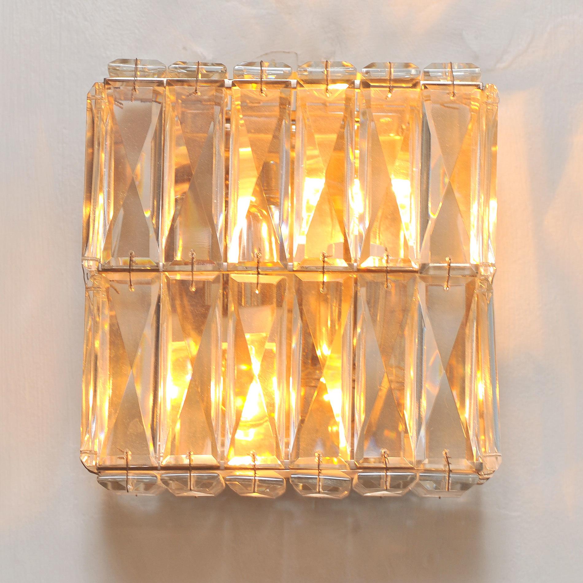 Square ‘jewel’ wall lights each with 38 faceted glass drops to ensure maximum glamour.