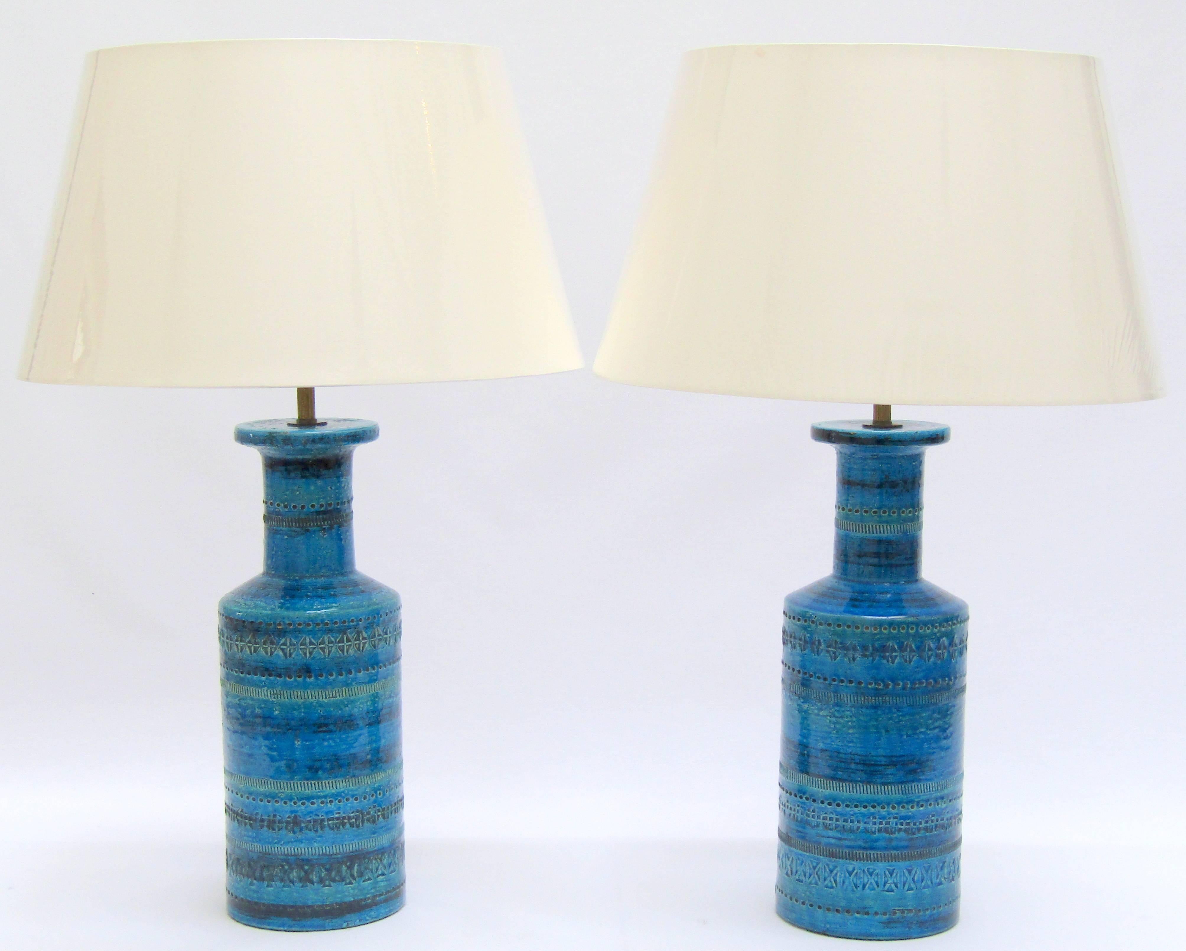 A pair of ceramic Rimini blue table lamps
Designed by Aldo Londi for Bitossi
Re-wired and PAT tested
Modern shades
Italian, circa 1960

Measures: Height 13 ¾ in / 35 cm without shade
 24 in / 61 cm including shade.
