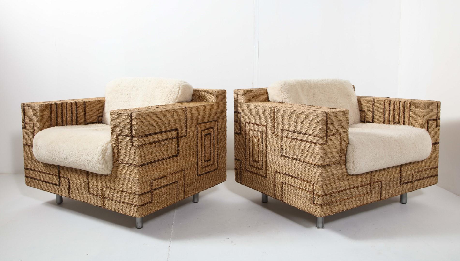 A pair of 1970s Italian rope-inlaid lounge chairs, with geometric line patterns in a contrasting color. Cylindrical metal legs. Newly made shearling cushions, separate back & seat cushions. 

Measures: Arm height: 24