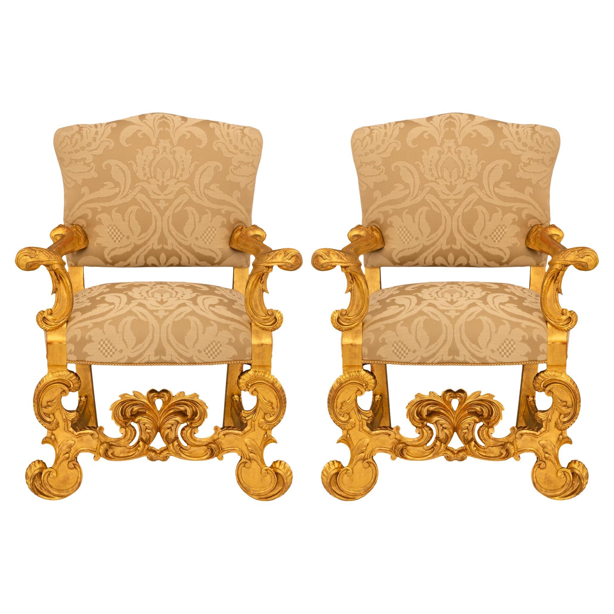 Pair of Italian 19th century Baroque st. Giltwood armchairs.