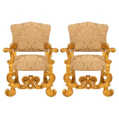 Pair of Italian 19th century Baroque st. Giltwood armchairs.