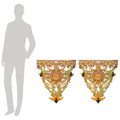pair of Italian 19th century Baroque st. glazed patinated wood wall brackets