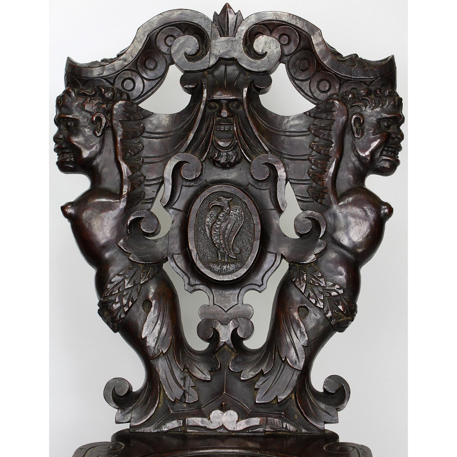 Pair of Italian 19th Century Baroque Style Carved Walnut Sgabello Side Chairs In Fair Condition For Sale In Los Angeles, CA
